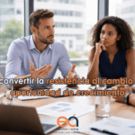 Equipo profesional en reunión mostrando resistencia al cambio mientras conversa en una oficina moderna