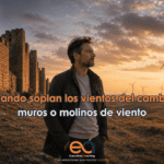 Ejecutivo observando muros y molinos de viento como metáfora del liderazgo ante el cambio